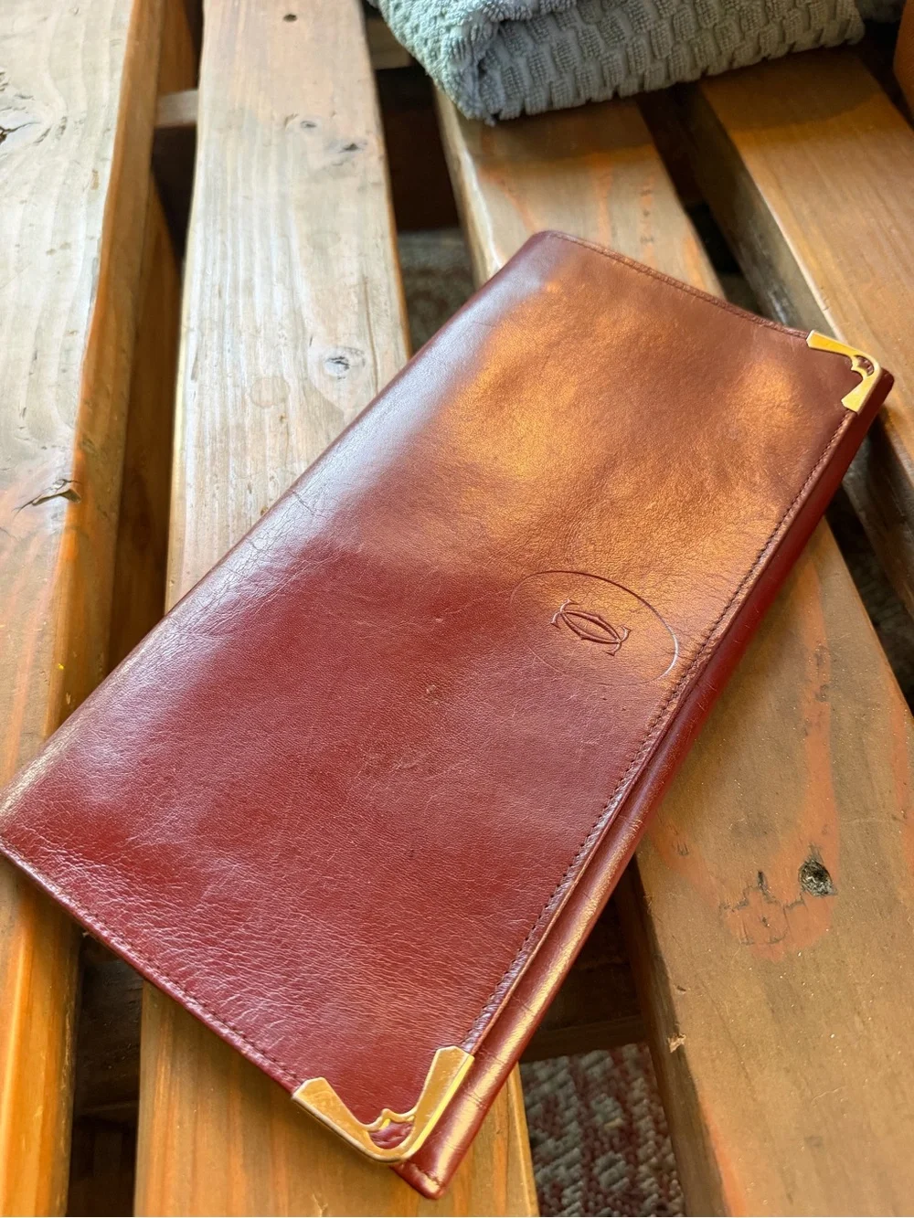 Vintage Cartier Burgundy Leather  clutch with Gold Corner Accents
